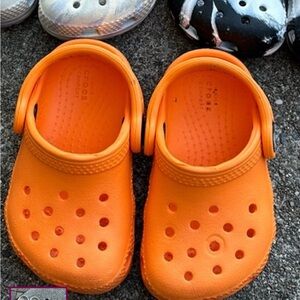 Orange crocs